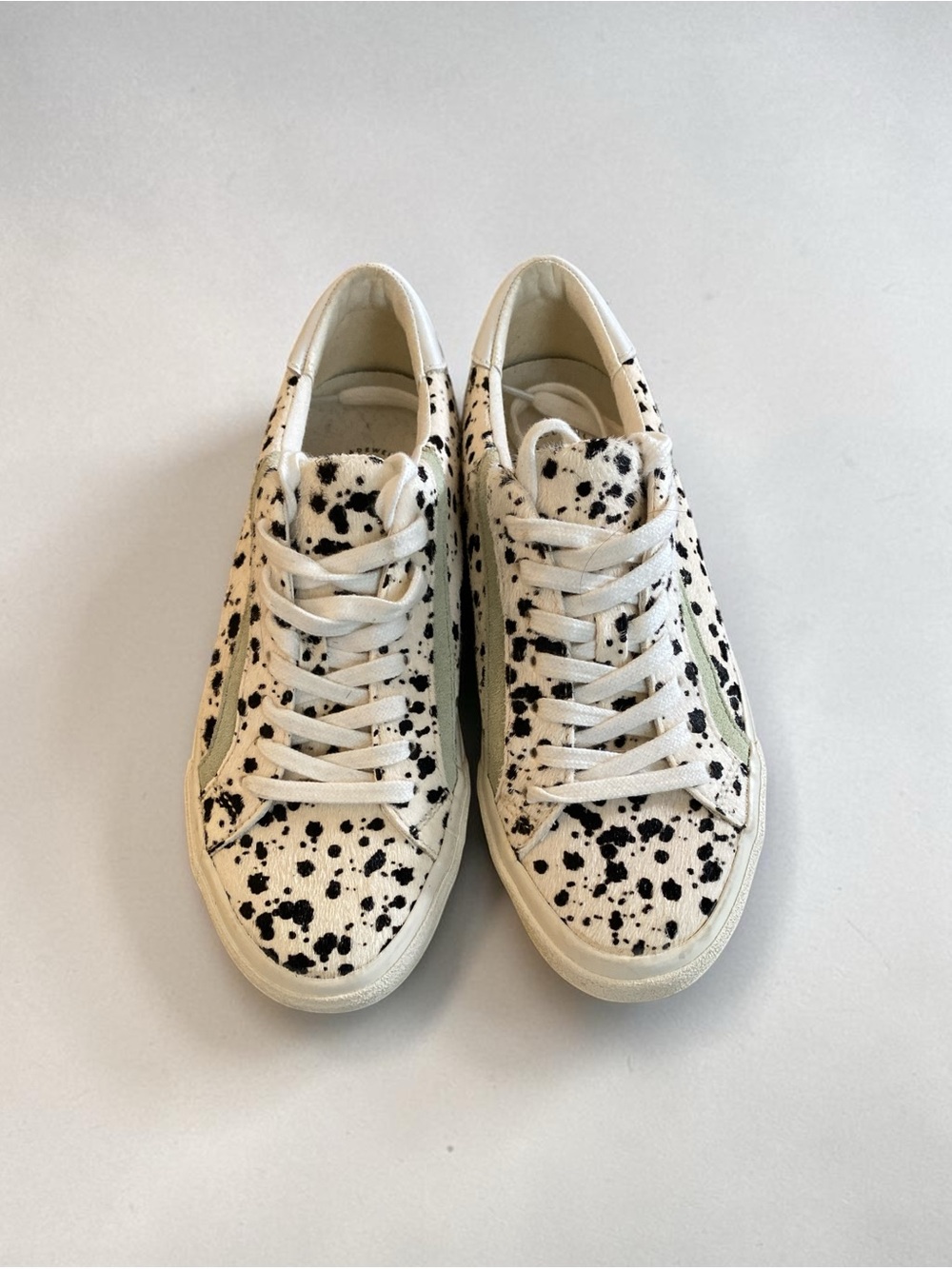 Off white   leather Sneakers with real fur splatter design.